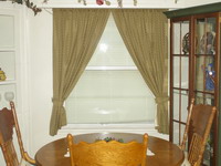 Dining area with energy efficient window added to the existing window