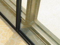 Hotel room soundproof window installation - close up