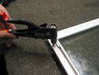 A tool being used on a window frame A tool being used on a window frame